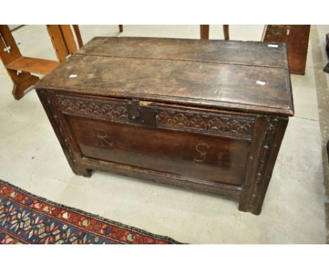 A period oak kist of small proportions, with monograms to front panel, R S , dimensions approx. 86 x 47 x 50cm