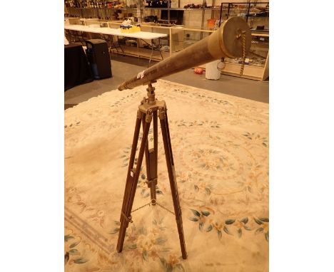 Large antique style brass telescope with wooden tripod  CONDITION REPORT: Lenses appear clear and undamaged generally require