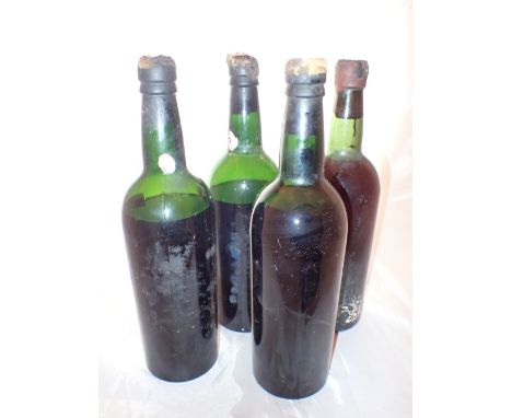 Four bottles of vintage 1960s Port racked and cellared ( all with some losses )