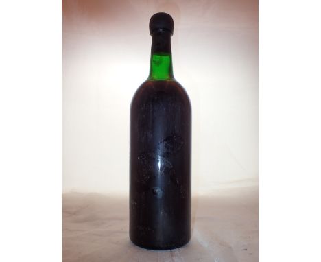 Bottle of Sandeman 1963 vintage Port racked and cellared ( little of label remaining )