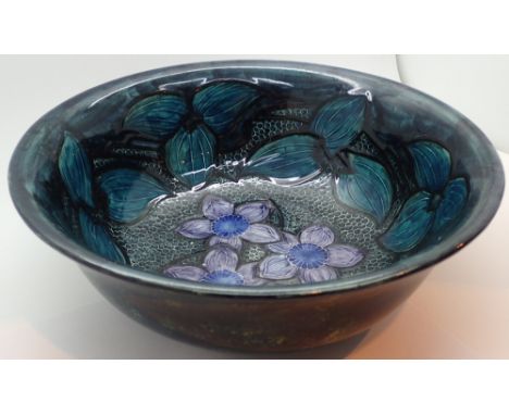 Large Hancock and Sons Morrisware ceramic bowl designed by George Cartlidge with mottled green exterior and painted Clematis 