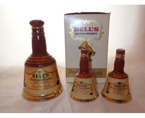 Decanter of Bells Scotch whisky 6 2/3 oz and two miniature Bells decanters all with contents