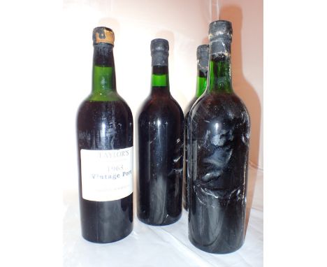 Four bottles of Taylors 1963 vintage port racked and cellared