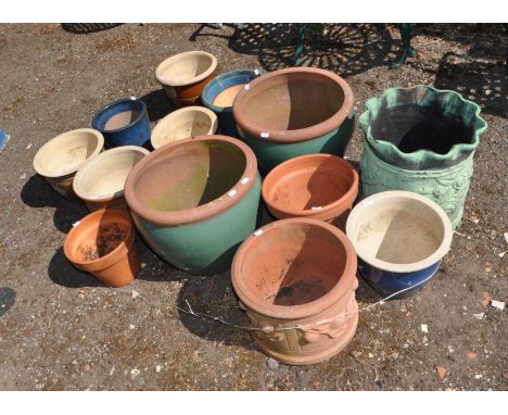 A SELECTION OF GARDEN POTS, including nine glazed, three terracotta and a verd de Gris painted terracotta cot (13), Condition