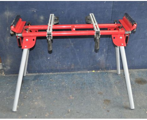 A WORKZONE TITANIUM + COMPOUND MITRE SAW FOLDING STAND, with roller extensions