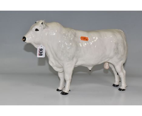 A SHEBEG POTTERY STANDING BULL, a model of possibly a White Park bull, signed D Thomson on the underside, (1), (Condition Rep