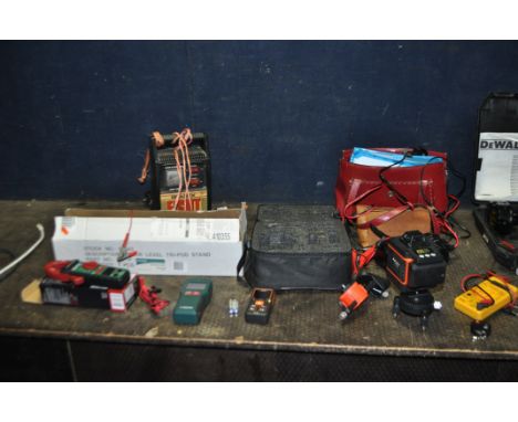 A SELECTION OF ELECTRICAL TOOLS, including an A-BF Astrion green laser level with case and remote, a Hilda laser measure, a P