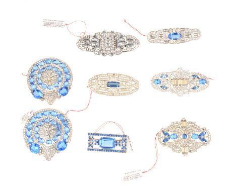 Nine vintage Art Deco brooches, various shades of blue paste, a matching pair of blue and white paste circular brooches, 50mm