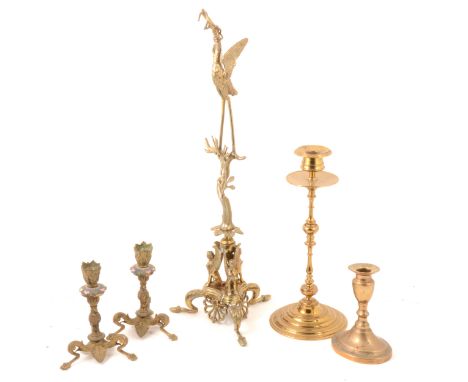 A pair of Victorian brass and enamelled small candlesticks, each with a tripod base, paw feet separated by leaves, 16cm; a si