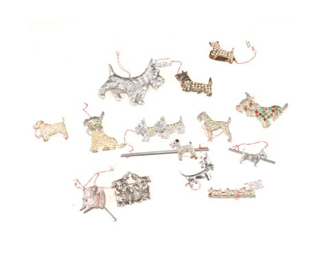 Fourteen vintage white metal Scottie and Terrier dog brooches, nine paste set, 25-40mm, one an 80mm bar brooch, a 65mm alloy 