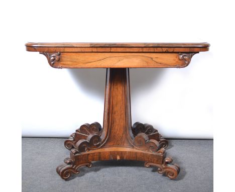 Victorian rosewood card table, rectangular foldover top with rounded corners, moulded edge, baize lined interior, carved frie