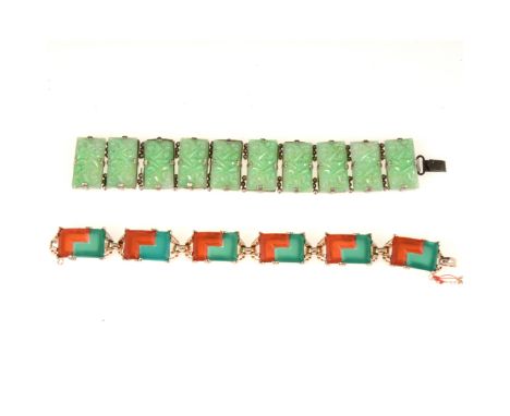 A vintage white metal bracelet claw set with ten moulded green glass panels each 25mm x 12mm, length 17cm, a gilt metal brace