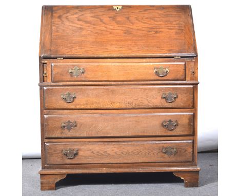 Oak bureau, fall-front enclosing a sparsely-fitted interior, four long drawers below, bracket feet, width 85cm, depth, 45cm, 