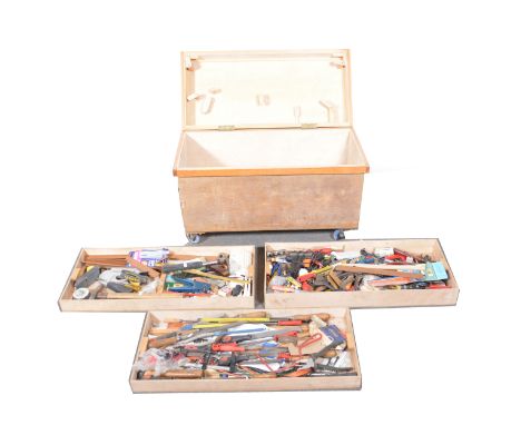 A large modern tool chest, with carpentry tools