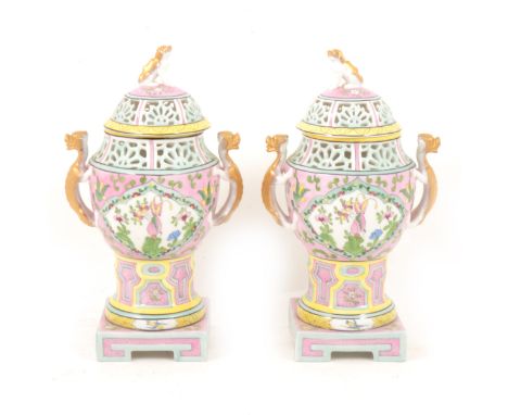 Pair of Dreseden porcelain Chinese-style covered vases, late 20th Century, pierced covers and shoulders, the cover with templ