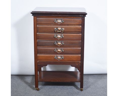 Edwardian walnut music cabinet, nrectangular top, six drawers, moulded legs joined by a shelf, width 52cm, depth 39cm, height