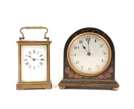Edwardian black japanned mantel clock, domes case, Swiss movement, 14cm, and a brass carriage clock, non-striking, 12cm.