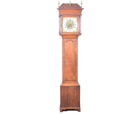 Oak longcase clock, moulded casket top, with three brass urn finials, cavetto cornice, plain frieze, the hood with turned col