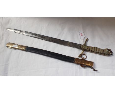 A 19TH CENTURY NAVAL DAGGER by Geive Matthews &amp; Seagrove Ltd with brass mounted leather scabbard 