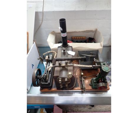 A STUART MODEL STEAM ENGINE with boiler and a small collection of 0 gauge tin railway items