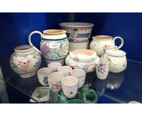 A COLLECTION OF POOLE POTTERY with traditional hand painted decoration