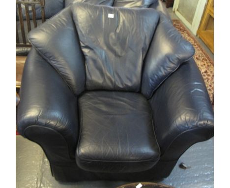 Modern leather two seater sofa and matching armchair. (2)(B.P. 24% incl. VAT)