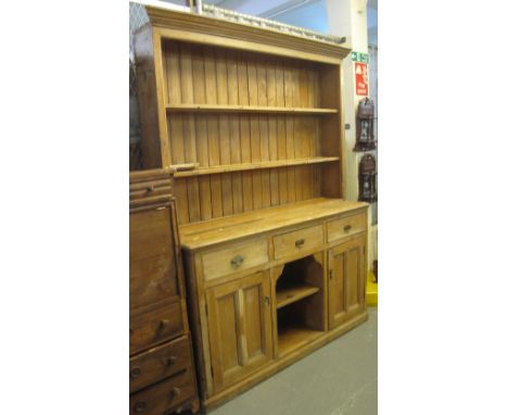 Late Victorian/Edwardian stripped pine dog kennel dresser with two shelf boarded rack back and three drawers with two blind c