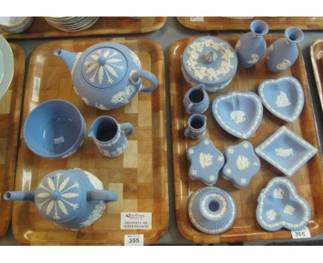 Two trays of Wedgwood Jasperware blue and white items to include; bullet shaped teapot, milk jug, sucrier, miniature jugs, ba