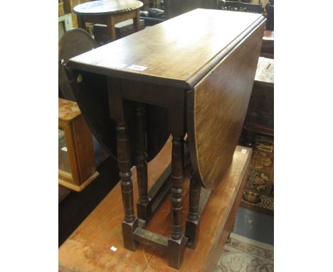 20th Century oak gate legged table. (B.P. 24% incl. VAT)