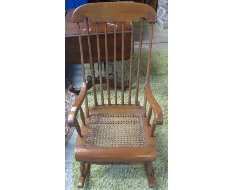 Early 20th Century Spanish mixed woods stick backed rocking chair. (B.P. 24% incl. VAT) 