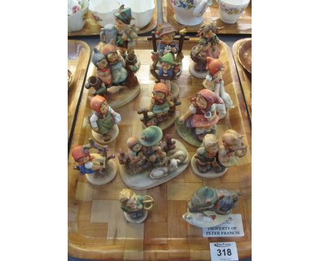 Tray of fourteen Hummel figurines/figure groups. (14)(B.P. 24% incl. VAT) CONDITION REPORT: Rather grubby. All appearing fine