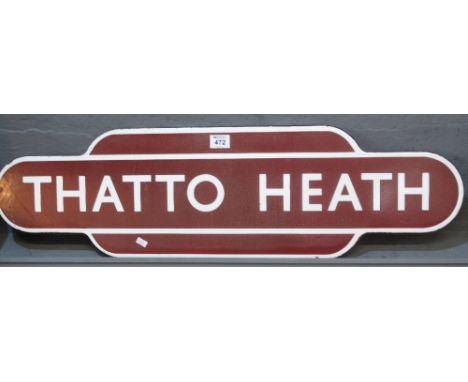 Metal enamelled railway sign Thatto Heath. (Merseyside), 93cm long approx. (B.P. 24% incl. VAT) CONDITION REPORT: Does have s