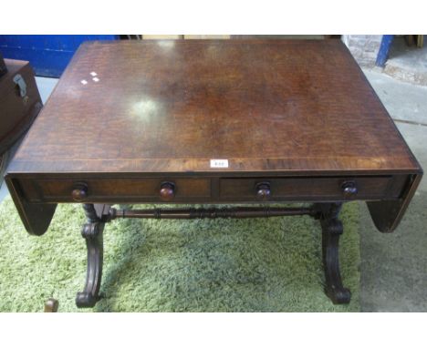 William IV plum pudding mahogany rosewood cross banded sofa table with single drawers to each side on turned end supports wit