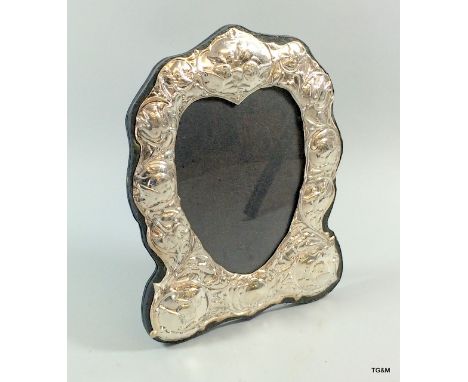 A Silver Embossed Heart Shaped Easel Back Picture Frame