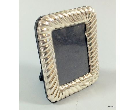 A Small Silver Easel Back Picture Frame