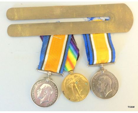A WW1 war Medal named to 222888 Airman 2nd class H.E.Byrne of the Royal Air Force and his brass button cleaning stick which i