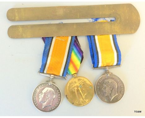 A WW1 war Medal named to 222888 Airman 2nd class H.E.Byrne of the Royal Air Force and his brass button cleaning stick which i