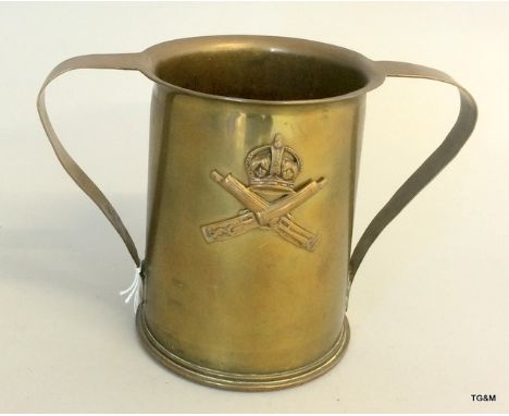An interesting WW1 trench art double handled jug made from a 1916 British 18 pounder shell 10cms diameter by 13cms high with 