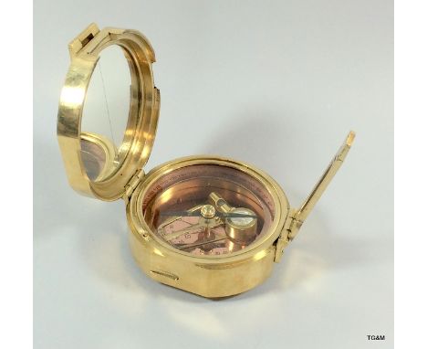 A Brass Cased Compass And Sundial By Ross Of London