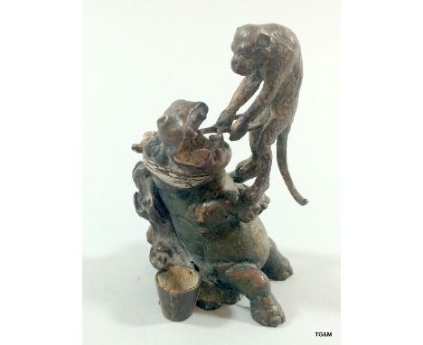 A Cold Painted Bronze Hippo And Monkey Dentist