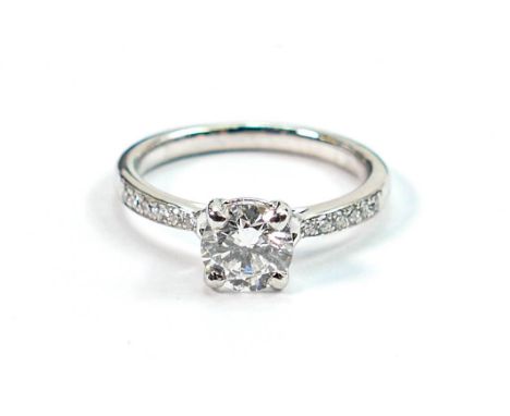 Brilliant cut diamond large solitaire dress ring with diamond set shoulders: Complete with GIA verification report / certific