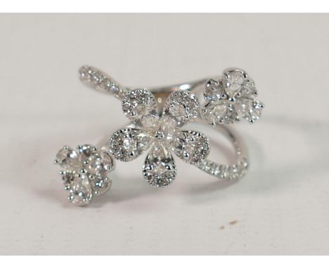 18ct white gold diamond fascinator style ring in excess of 2 carat of diamonds:  Set 11 x pear cut diamonds and 38 brilliant 