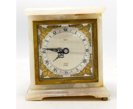 Onyx white cased Elliot miniature Bracket clock retailed by Tarrat: Height 15cm, 14cm width, 7cm depth, with key 