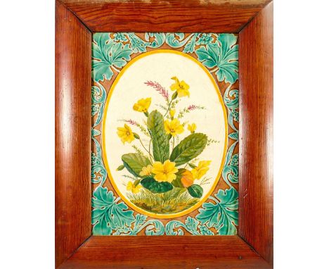 19th century Wedgwood Majolica tile: Hand painted centre oval panel of flowers in a leaf border, in pitch pine frame, overall