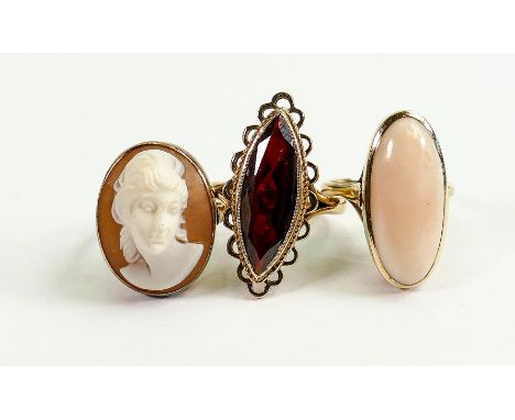 Three gold gemset rings: Coral 9ct gold ring, together with un-hallmarked cameo set ring tested as 9ct or better and hallmark
