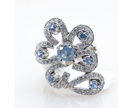 14ct white gold fancy blue topaz &amp; white sapphire dress ring: In a very large setting measuring 35mm long, this impressiv