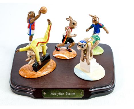 Royal Doulton Bunnykins set of Olympic games figures: Comprising Swimmer DB206, Basketball DB208, Gymnast DB207, Soccer DB209