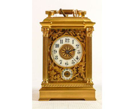 Magnificent large gilded brass cased quarter repeating carriage clock with alarm: Measures 19.5cm including handle.  Winds, t