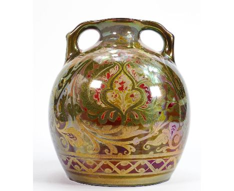 Richard Joyce for Pilkington Royal Lancastrian lustre two handled vase: Painted with red flower heads on a green foliate scro