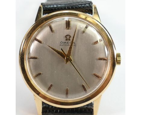 18ct gold Omega gents automatic Wristwatch: Winds, ticks, sets &amp; runs.  Measures 34mm  wide appx., excluding button. 